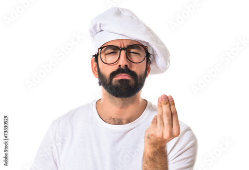 Chef doing italian sign photo