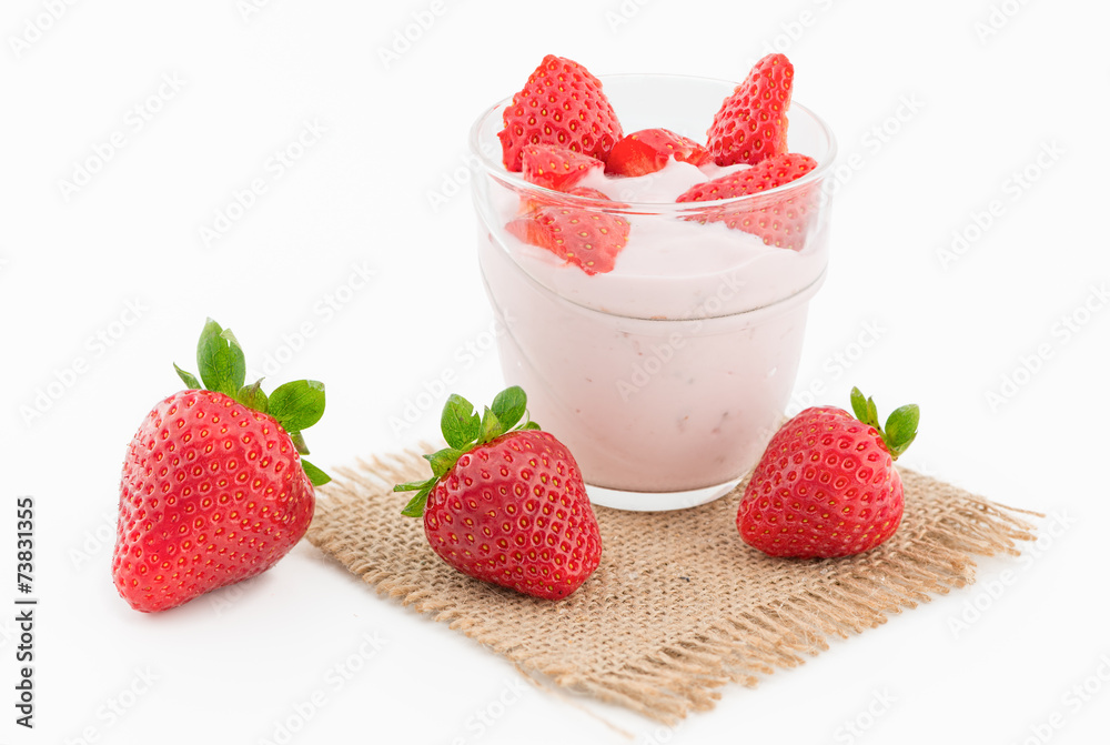 Fresh strawberry with yogurt in a glass isolated on white Fresh strawberry with yogurt in a glass isolated on white