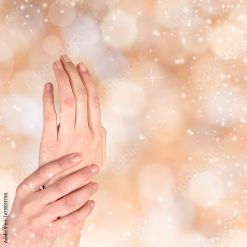 Woman hand on Christmas background