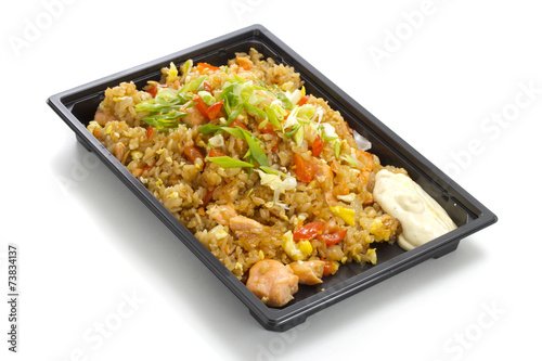 asian rice with meat in plastic box