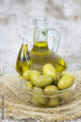 Olive oil and green olives