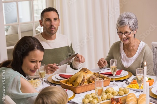 Smiling multi generation during christmas dinner