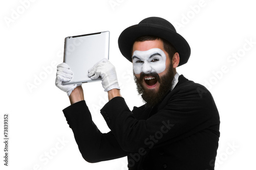 mime as a businessman crushing computer parts in rage