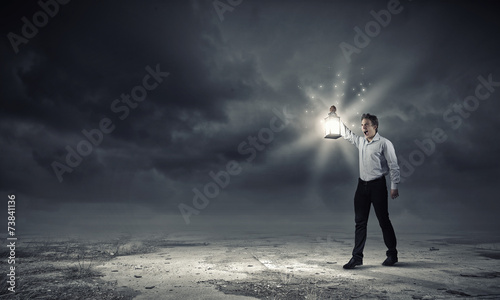 Man with lantern