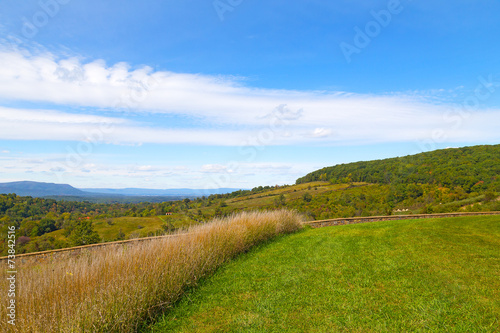 Green meadows and hills of countryside