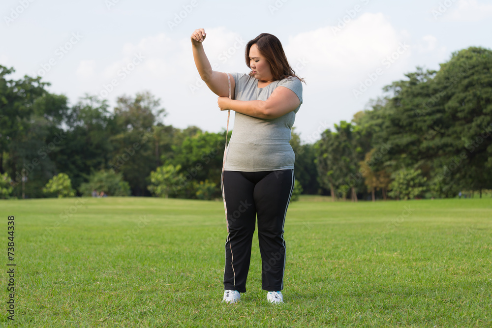 obese women is worrying about her overweight obese women is worrying about her overweight