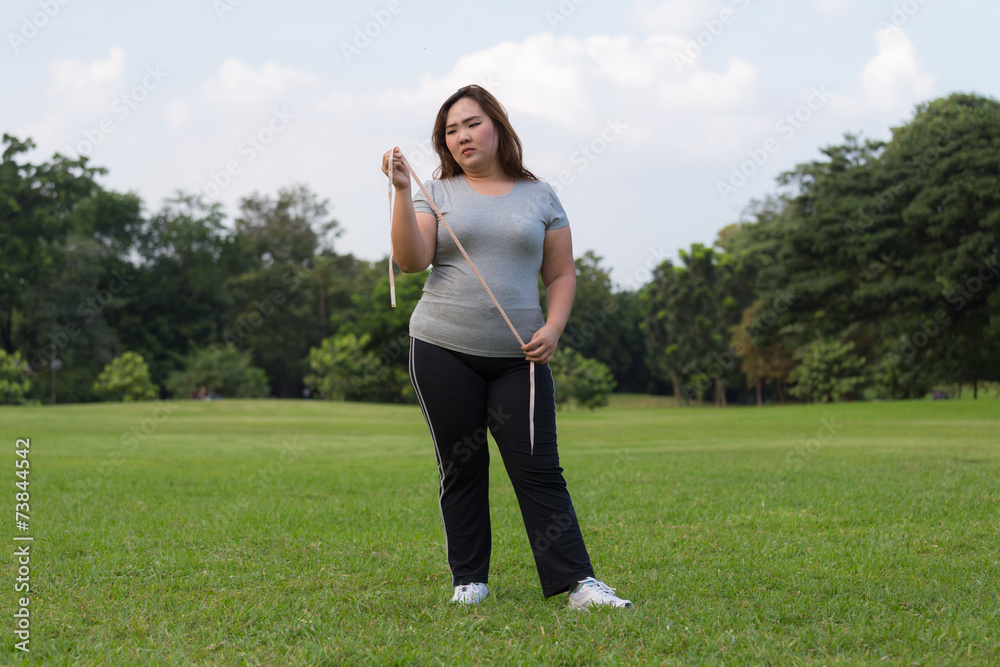 obese women is worrying about her overweight obese women is worrying about her overweight