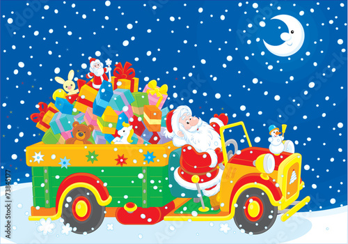 Santa Claus with Christmas gifts on his truck