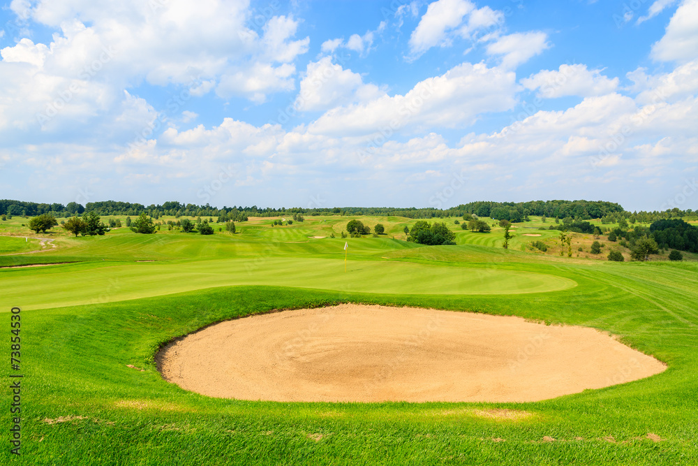 Golf course green play area on sunny summer day, Poland Golf course green play area on sunny summer day, Poland