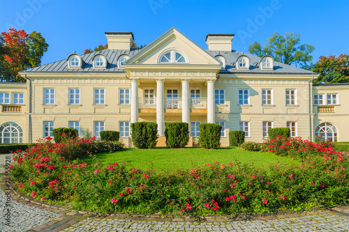 Red roses in park of beautiful palace in Smilowice, Poland © pkazmierczak