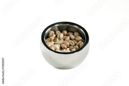 pistachios in silver bowl