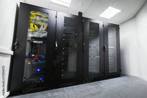 Modern server room with black computer cabinets