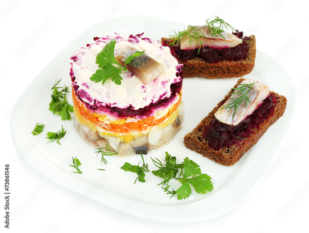 Russian herring salad  and sandwiches on plate isolated on