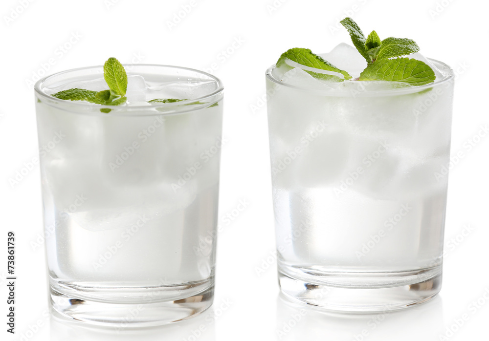 Glasses with ice cubes isolated on white Glasses with ice cubes isolated on white