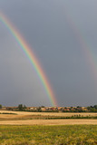 Double Rainbow in Village Landscape