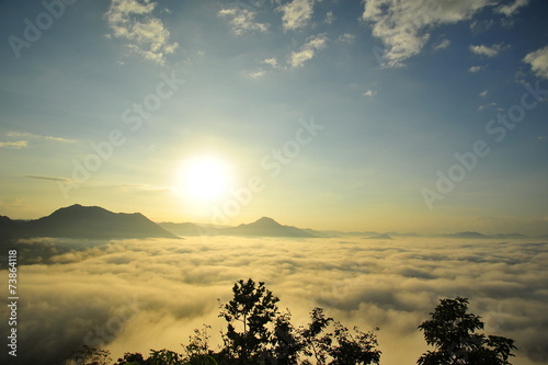 Mountain Landscape Above the Clouds at Sunrise