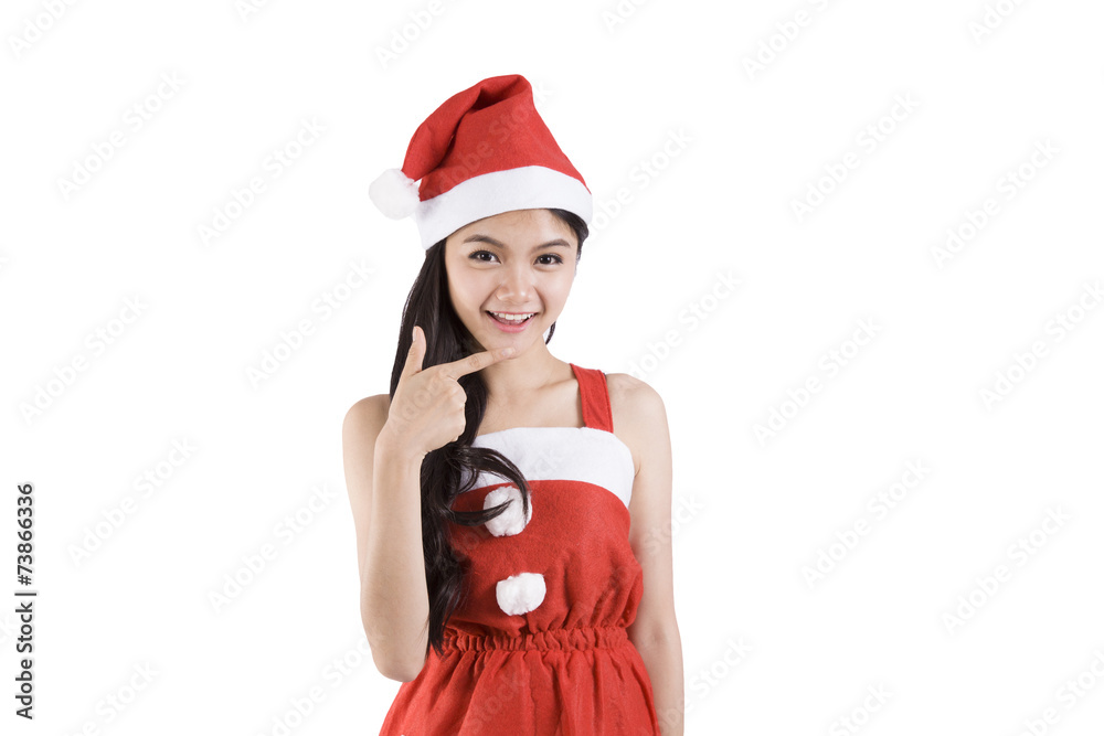 young christmas woman pointing at copy space over white backgrou young christmas woman pointing at copy space over white backgrou
