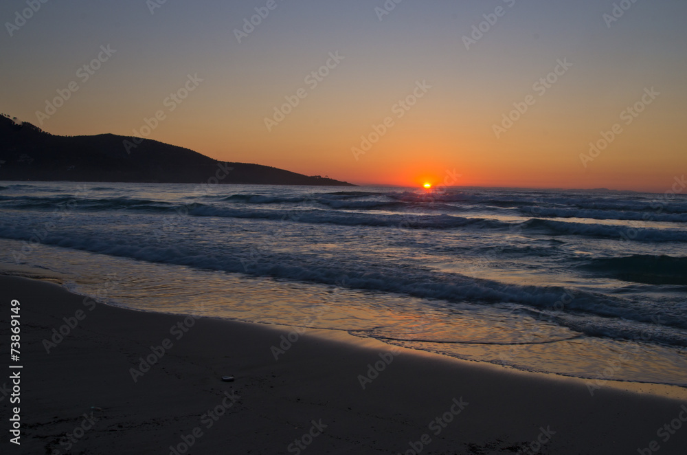 Sunrise and waves at golden beach, Thassos island