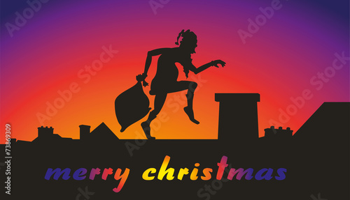 creeping santa claus on the background of sunset