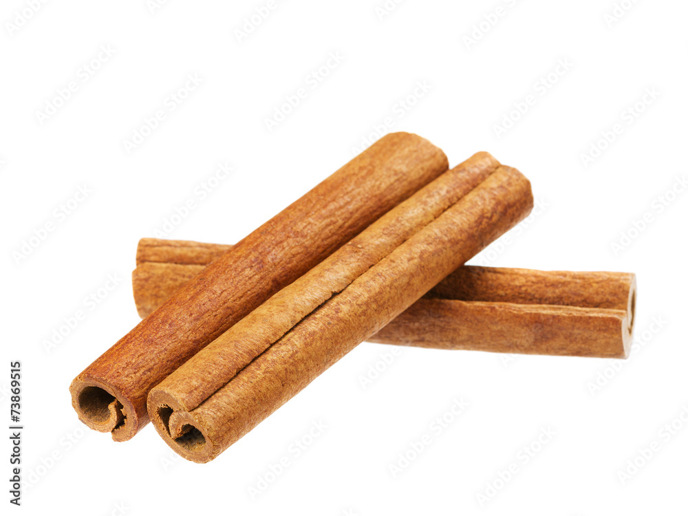 heap of cinnamon sticks isolated on white heap of cinnamon sticks isolated on white