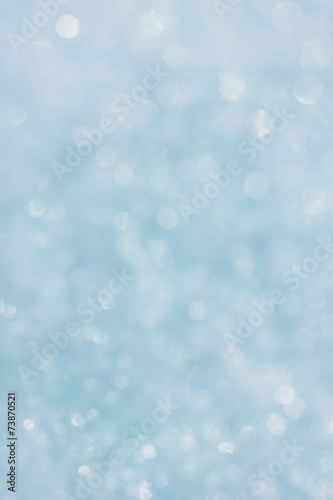 winter snow background with magic bokeh effect