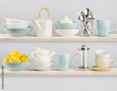 Kitchenware on wooden shelves