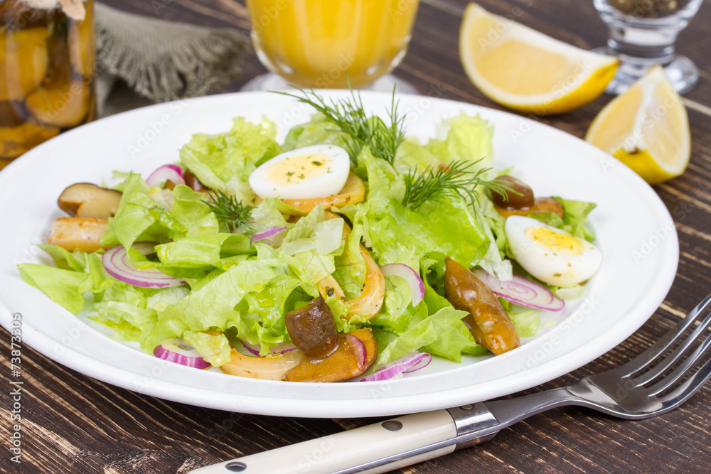 Fresh salad with mushrooms, squid and quail eggs Fresh salad with mushrooms, squid and quail eggs