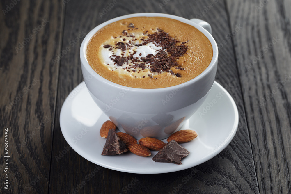 cup of freshly made cappuccino with latte art cup of freshly made cappuccino with latte art
