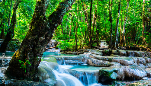 Fototapeta Naklejka Na Ścianę i Meble -  Waterfall in the tropical forest at Erawan National Park, Thaila