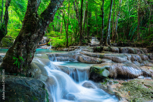 Fototapeta Naklejka Na Ścianę i Meble -  Waterfall in the tropical forest at National Park, Thailand