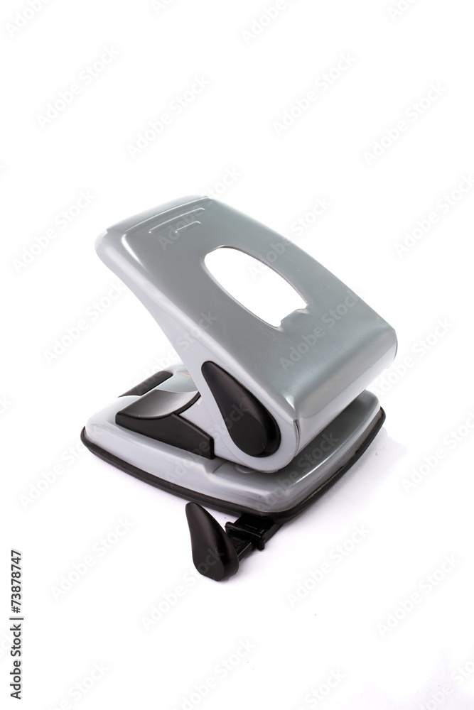 Office paper punch isolated on a white background Office paper punch isolated on a white background