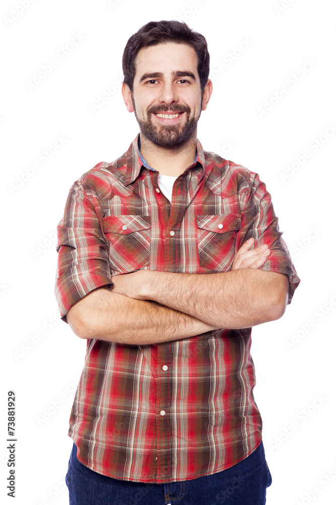 Smiling young casual man with arms crossed, isolated on white ba Smiling young casual man with arms crossed, isolated on white ba