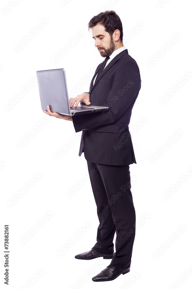 Confident business man with a laptop, isolated on white backgrou Confident business man with a laptop, isolated on white backgrou