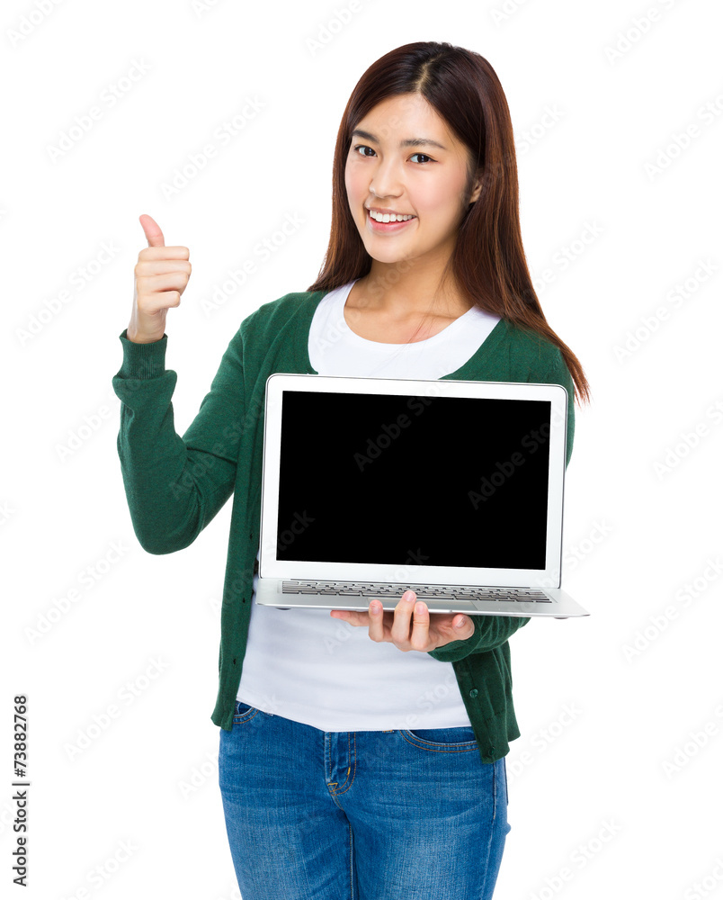 Woman show with blank screen of computer and thumb up Woman show with blank screen of computer and thumb up