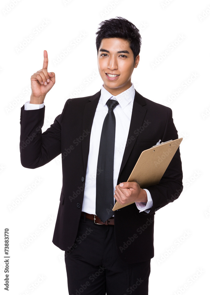 Businessman with clipboard and finger point up Businessman with clipboard and finger point up
