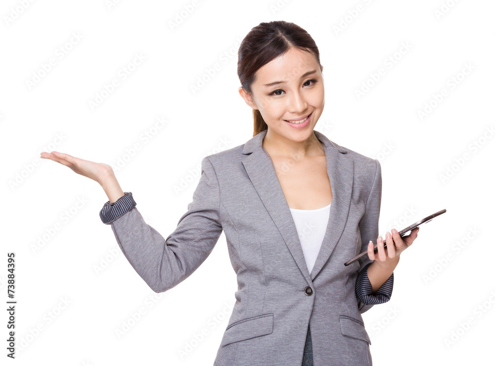 Businesswoman with tablet and open hand palm Businesswoman with tablet and open hand palm