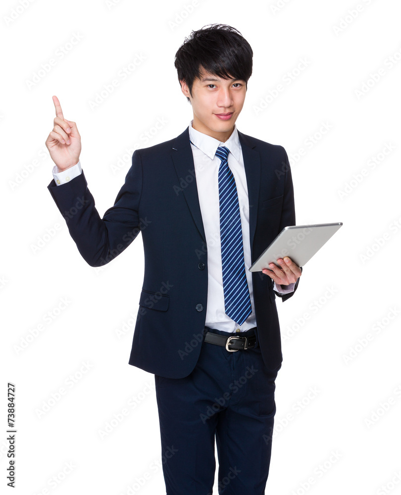 Businessman hold with tablet and finger point up Businessman hold with tablet and finger point up