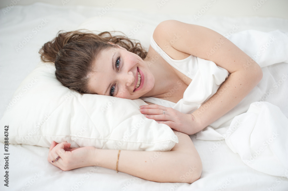 Beautiful young woman asleep, on white background Beautiful young woman asleep, on white background