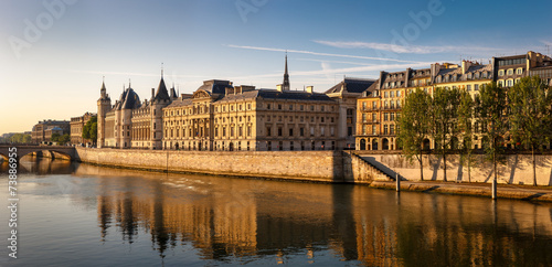 Photography Glowing morning light on the Conciergerie and the River Seine, P