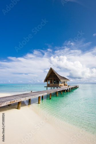 Beautiful scenery over beach with the water villas, Maldives