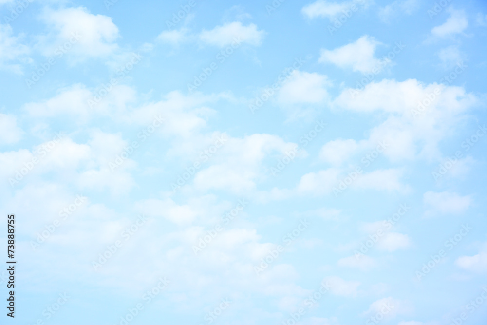 Light blue sky with clouds