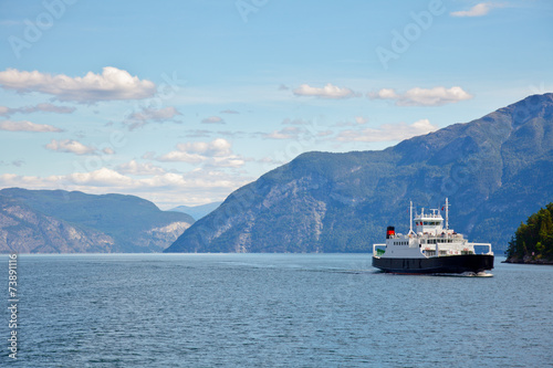 Ferryboat cruising Norwegian fjord