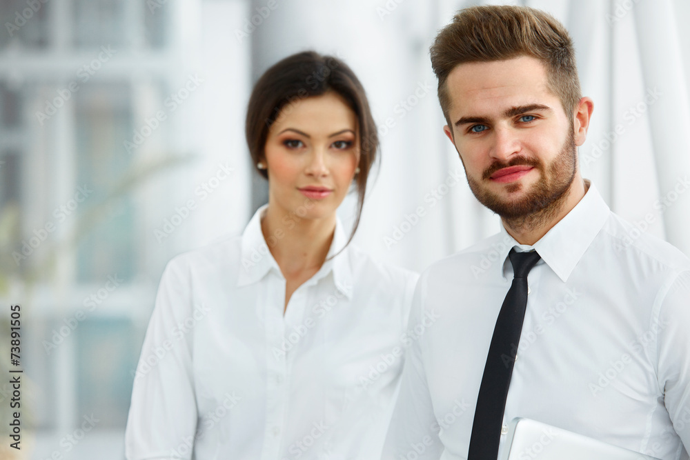 Business Team. Happy smiling people standing in a row at office Business Team. Happy smiling people standing in a row at office