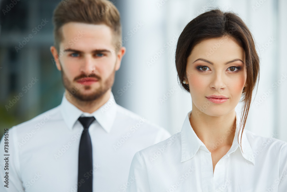Business Team. Happy smiling people standing in a row at office Business Team. Happy smiling people standing in a row at office