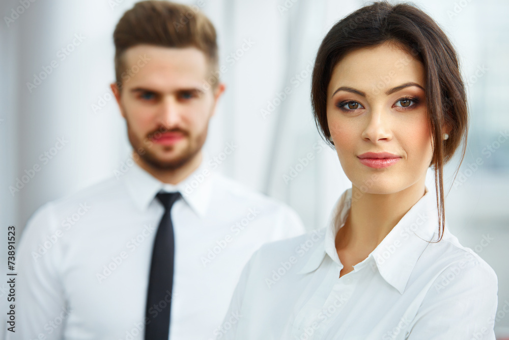 Business Team. Happy smiling people standing in a row at office Business Team. Happy smiling people standing in a row at office