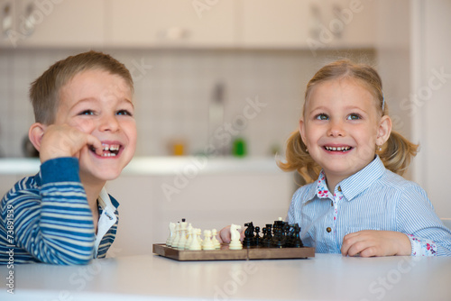 Cute children playing at home