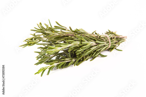 Bunch of rosemary tied up twine on a white background
