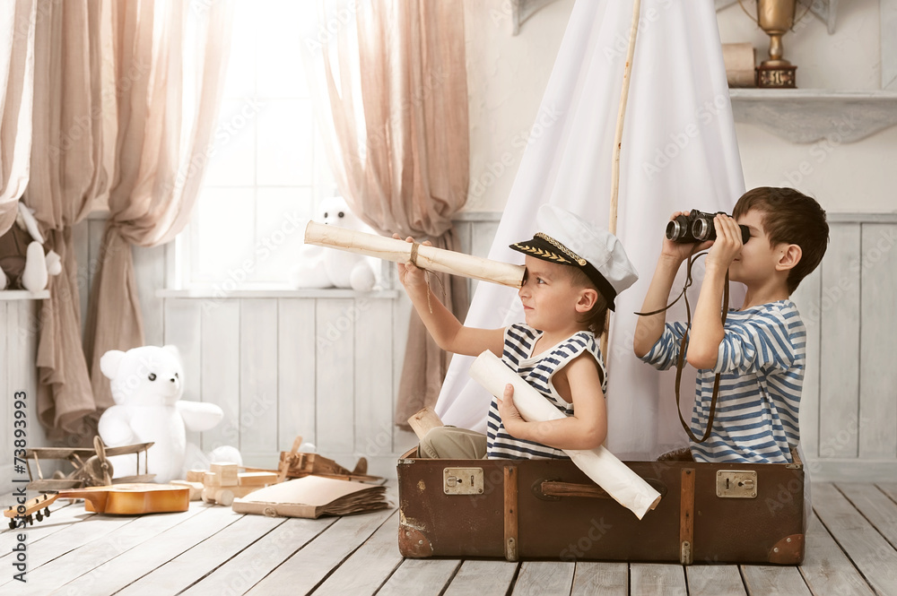 Boys in the image of sailors playing in her room - obrazy, fototapety, plakaty 