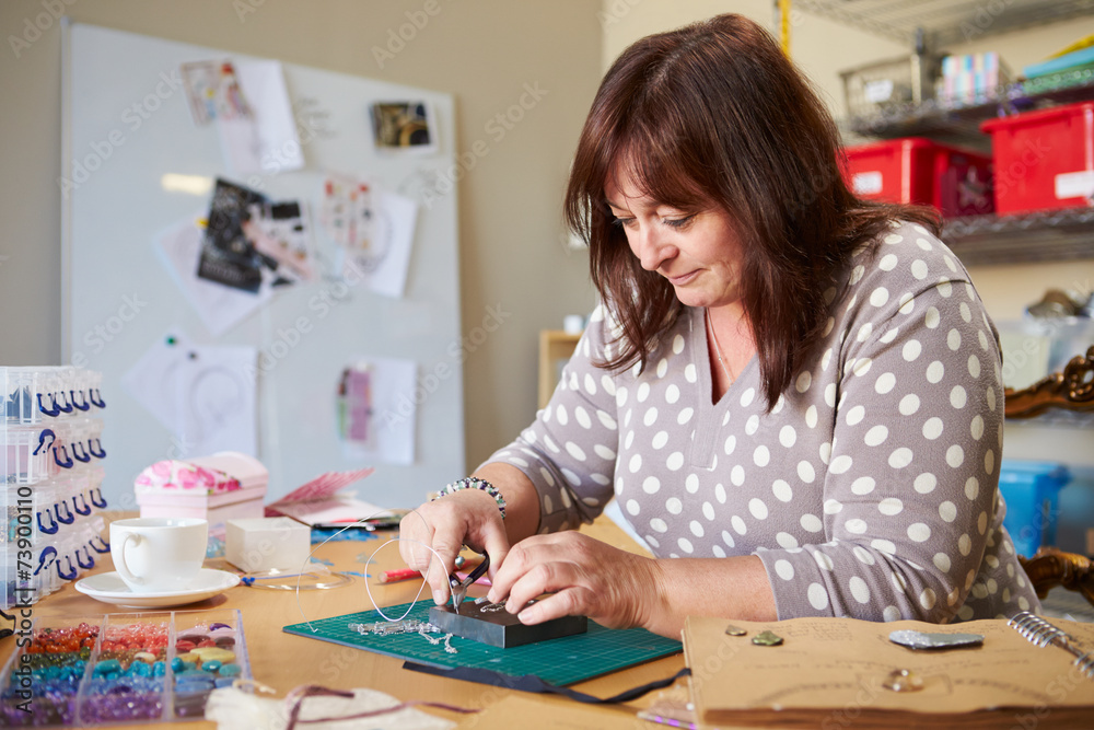 Mature Woman Making Jewelry At Home Mature Woman Making Jewelry At Home