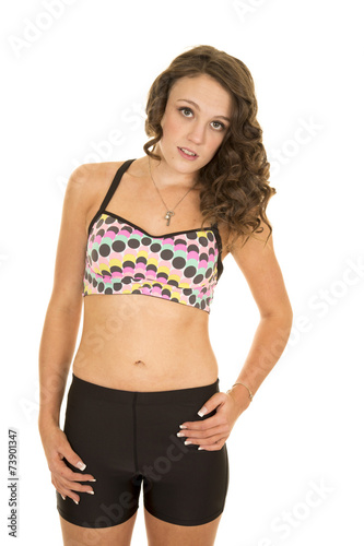 woman stand dots sports bra